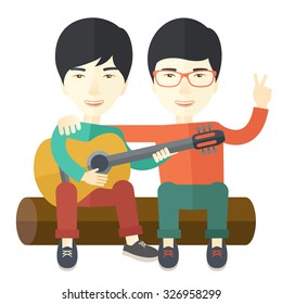 Two happy asian men  sitting on a log playing a guitar vector flat design illustration isolated on white background. Square layout.