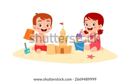 Two happy children are playing sand with bucket and shovel making sandcastle on beach