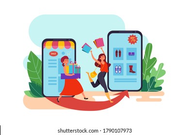 Two happy women go shopping online 