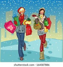 Two happy women with shopping bags and present boxes walking down snow covered street.