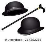 two hats and cane on white background