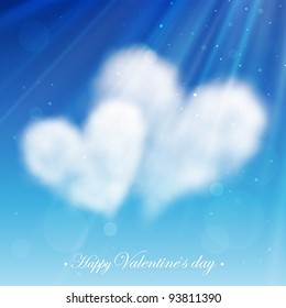 Two heart shaped clouds in the blue sky. Valentine`s day illustration.