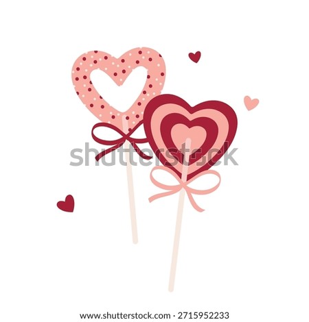 Two Heart shaped Lollipops with Ribbons and polka dots for Valentine's Day