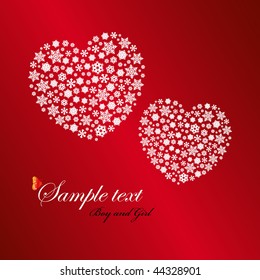 Two heart shapes made by snowflakes.