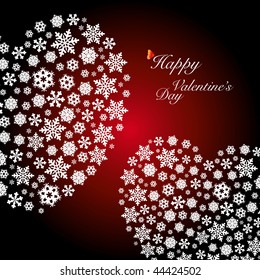 Two heart shapes made by snowflakes. Happy Valentine's Day.