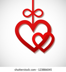 two  heart sliced from red paper