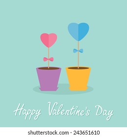 Two heart stick flowers in the pots and word love. Flat design. Happy Valentines day Vector illustration