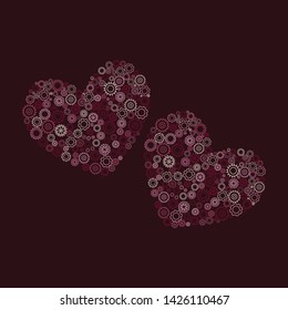 Two hearts of gears on dark background