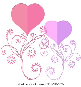 two hearts made of paper and curls