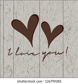Two hearts on wood - romantic background for St.Valentine's Day