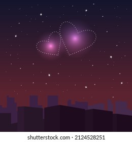 Two hearts soar in the night sky over the city