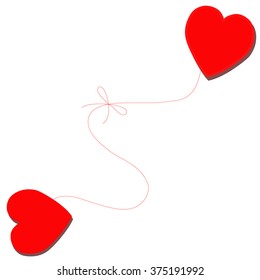 Two hearts tied together with red thread.