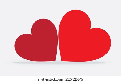 two hearts vector illustration laid on a gray background.