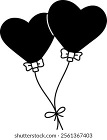 Two heart-shaped balloons tied together, symbolizing love and celebration