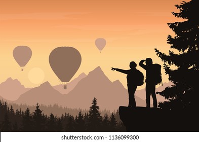 Two hikers looking down into the valley between mountains with forest and flying hot air balloons - vector