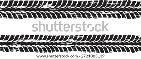 two horizontal grunge tire tread marks and textured wheel tracks isolated on white background