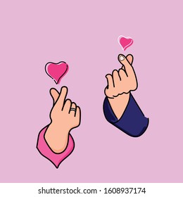 Two human hands doing Korean love hand sign, isolated in fuchsia background