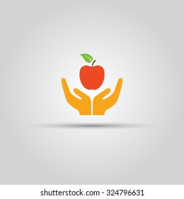 Two human hands offering red apple fruit isolated vector colored icon