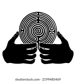 Two human hands and a round spiral maze or labyrinth symbol. Black and white silhouette.