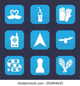 two icon. Set of 9 filled two icons such as swing, glove, navigation arrow, swan heart, soda bottle, maraca, chess pawn, walkie talkie