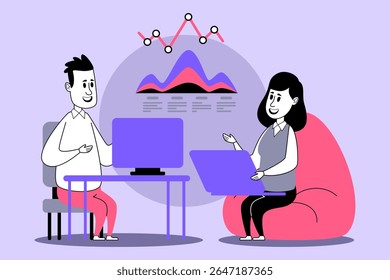 Two individuals engaged in productive discussion while working on their laptops. Man seated at desk, while woman sitting comfortably on beanbag