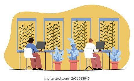 Two individuals working at desks in a bright workspace filled with plants, showcasing a modern office environment with a focus on productivity and creativity