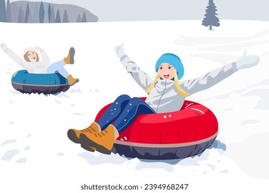 two joyful girl friends ride down the mountain on tubing