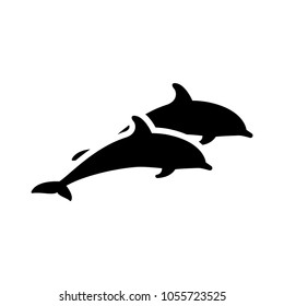 Two jumping dolphins. Vector illustration