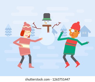 two kids play snowball fight in the winter weather