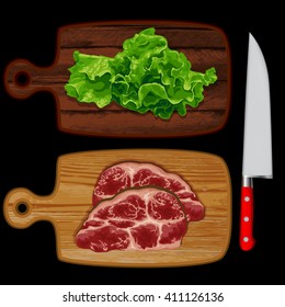 Two kitchen board, one is green salad, on another meat