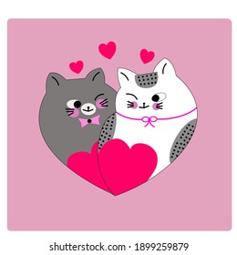 Two kittens, white and black on Valentine's Day