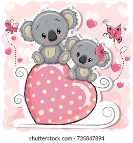 Two Koalas is sitting on a heart on a pink background