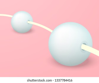 Two large coral beads on a pink background
