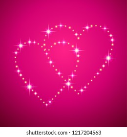 Two Led shining hearts  on pink background. Card for of St. Valentine
