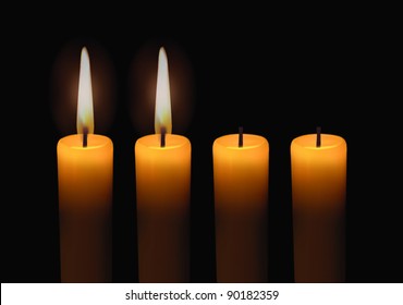 Two Lighted Advent Candles
with dark background