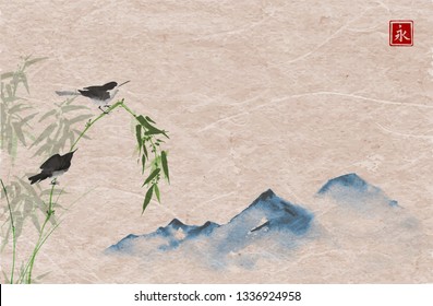 Two liitle black birds on green bamboo branch and far blue mountains on vintage paper background. Traditional Japanese ink wash painting sumi-e. Hieroglyph - eternity