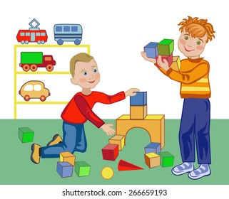 Two little boys build a house out of blocks in the kindergarten