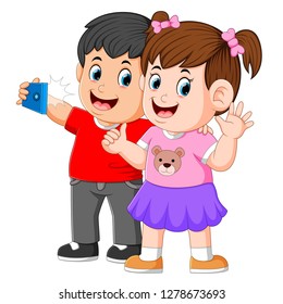 two little children are taking a perfect selfie with the happy face
