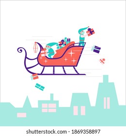 Two little elves in masks on Santa Claus sleigh deliver Christmas gifts. Contactless delivery of xmas boxes