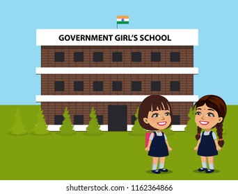 Two Little Indian Girls Wearing School Uniform Are Chatting In Front Of Their School Building