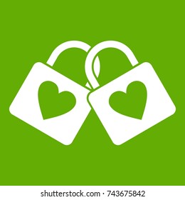 Two locked padlocks with hearts icon white isolated on green background. Vector illustration