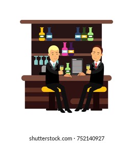 Two man best friends in formal suits sitting at the bar and drinking alcohol