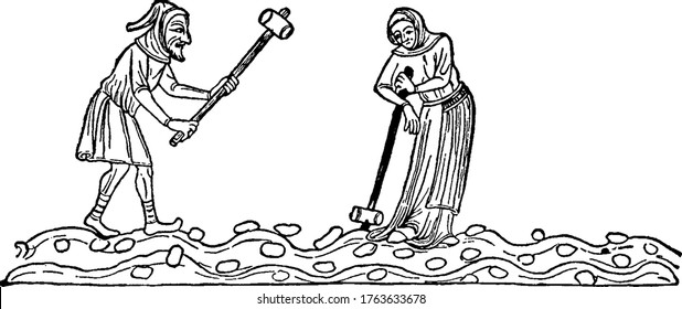 Two medieval peasants, a man and woman, break clods of earth apart with mallets. The man is swinging his mallet, while the woman appears to be resting on hers, vintage line drawing or engraving.