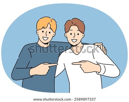 Two men friends hug and point finger towards buddy, rejoicing at long-awaited meeting. Boys brothers or friends smile looking at screen and experience positive emotions from opportunity to communicate
