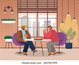 Two men friends sitting at a table eating pizza in pizzeria. Stylish male characters having lunch in restaurant with loft style interior with brick wall. Business partners has dinner in a cafe