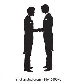 Dos hombres cogidos de la mano. Aislado en blanco.