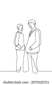 two men in hoodies are standing sideways and their hands in their pockets   looking at the viewer    one line drawing vector  concept two male friends; popularity hoodies among young people