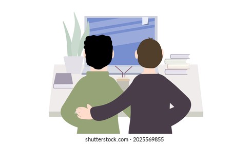 Two  men are looking at the laptop screen. Cozy workplace.