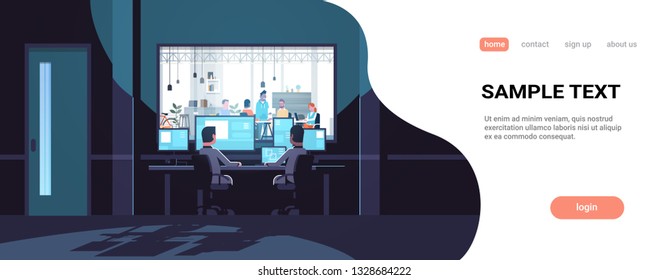 two men looking at monitors sitting behind glass window people working in co-working open space office center dark room interior surveillance security system horizontal copy space