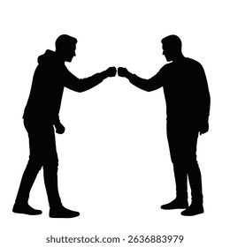 Two men silhouettes fist bumping greeting.